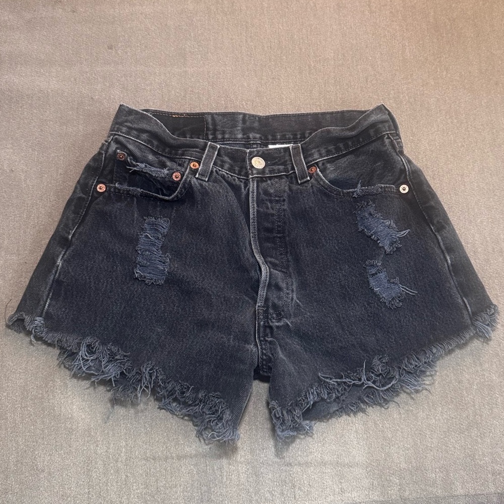 Vintage Levi’s 501 Distressed Denim Shorts in Black